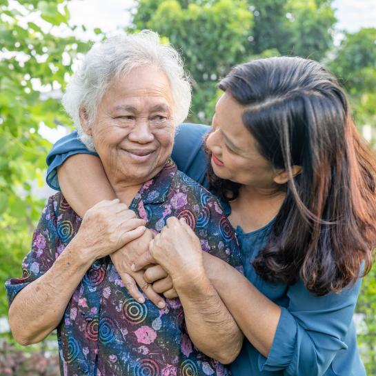 Asian-elderly-woman-with-caregiver-walking