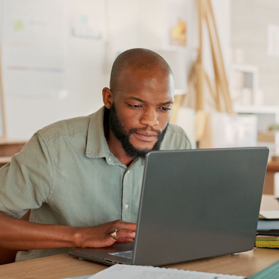 A man searching the laptop