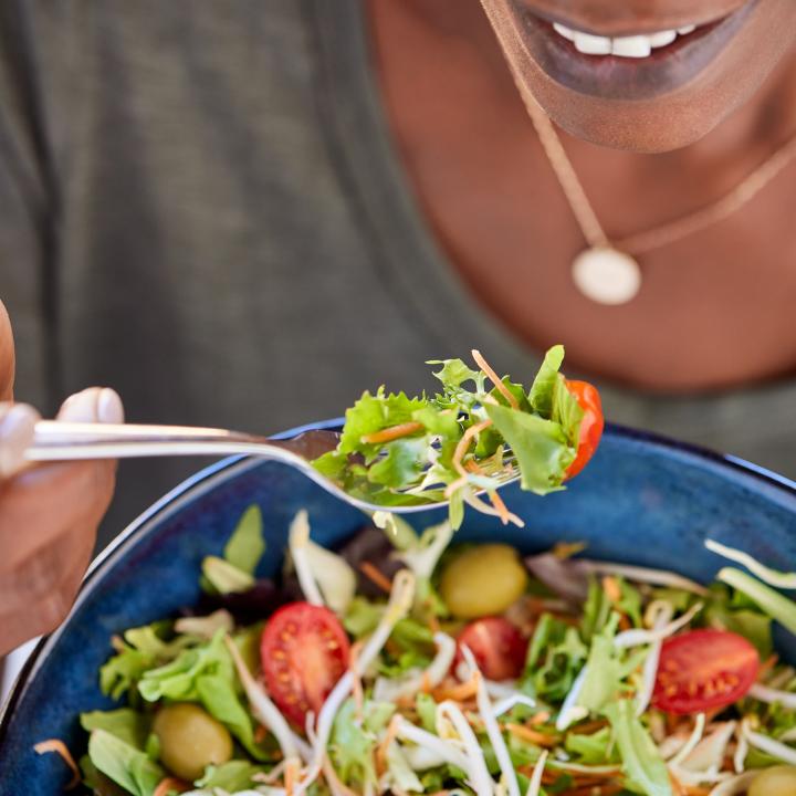 Woman eating a healthy salad