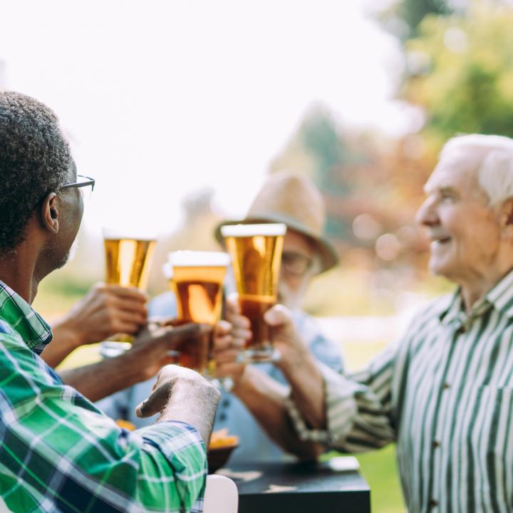  group-of-senior-friends-drinking-a-beer