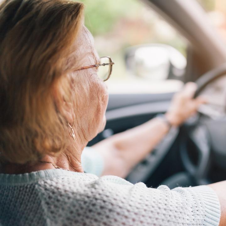 senior woman driving a car