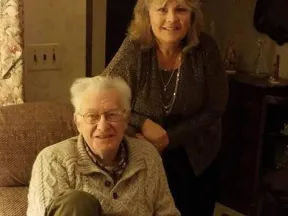 Photo of Eileen and an older man