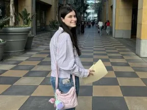 Photo of Camille looking over her shoulder