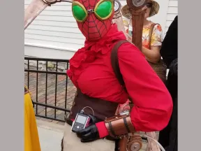 A person dressed as Steampunk Spider-Man with insulin pump