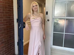 Photo of woman standing in a doorway