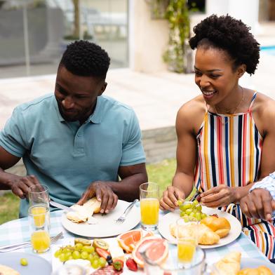 a family enjoying their food
