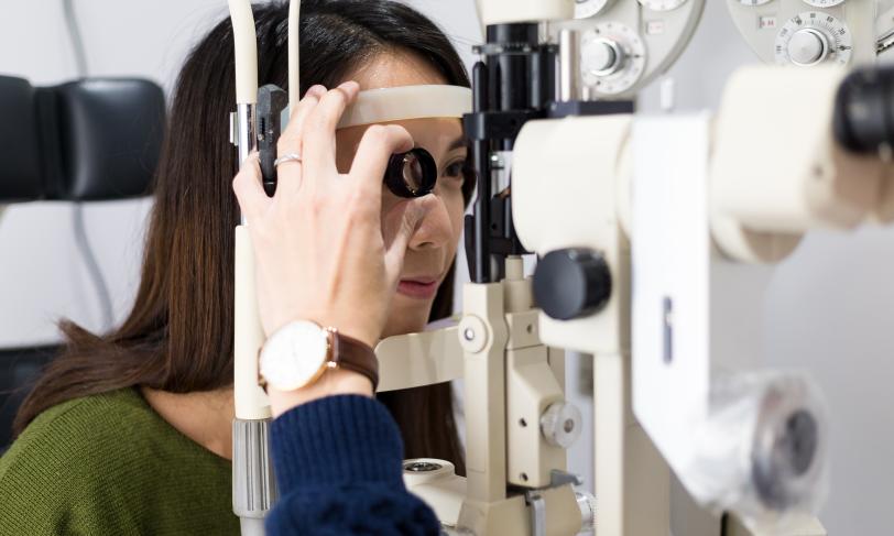A woman gets her annual diabetes eye exam 