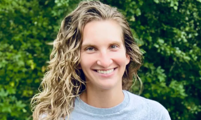 Photo of Bryanna sitting on a bench