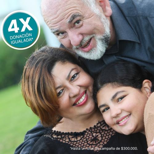 Family of three smiles for photo. 4X Donacion Igualada. Hasta un total de campana de $300.00