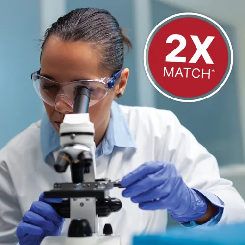 Female researcher with microscope 2X Match*