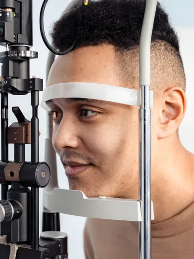 A man gets his eyes examined for diabetes eye disease